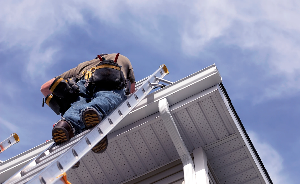 Five Star Construction crew member working on a home exterior in Keizer, Oregon